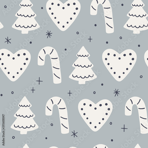 Christmas seamless pattern with gingerbread cookies. Vector background for winter holidays and Christmas design. Hand drawn surface pattern in flat style for wrapping paper, fabric, cards and gift tag