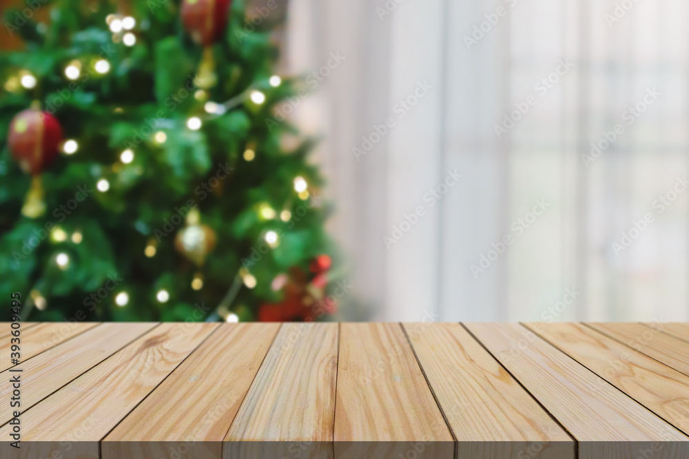 Empty table top with blurred Christmas tree with bokeh light background Empty table top with blurred Christmas tree with bokeh light background