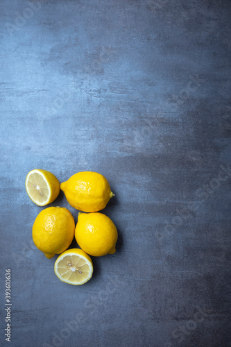 fresh yellow lemon, seen from above, free space for issues