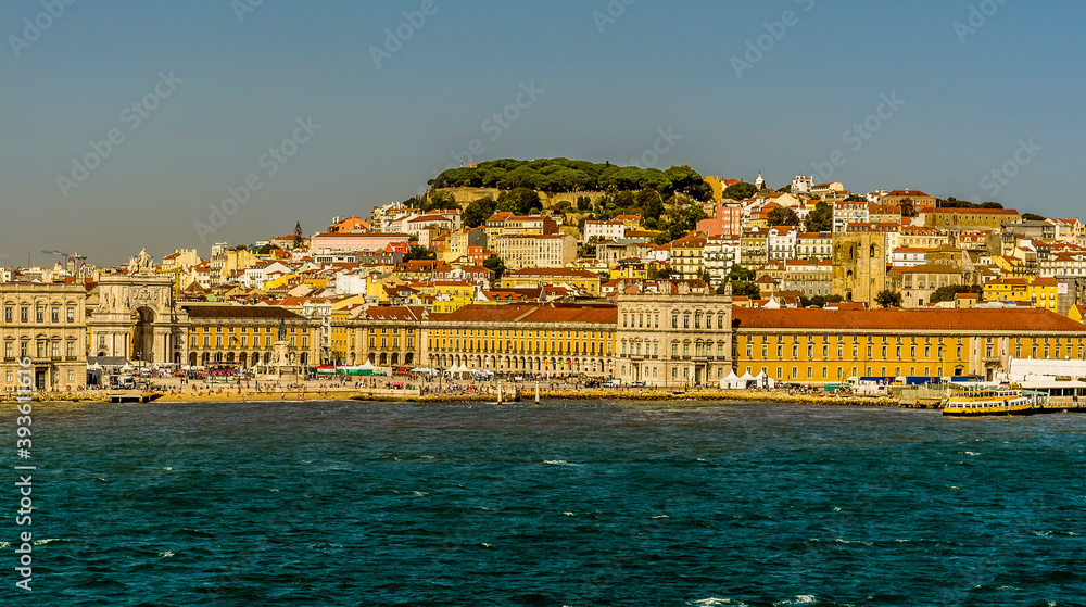 The Commercial Square and Castle Hill in Lisbon, Portugal viewed from the Tagus river