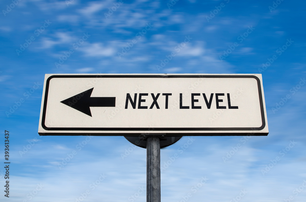 Next level road sign, arrow on blue sky background. One way blank road sign with copy space. Arrow on a pole pointing in one direction. Next level road sign, arrow on blue sky background. One way blank road sign with copy space. Arrow on a pole pointing in one direction.