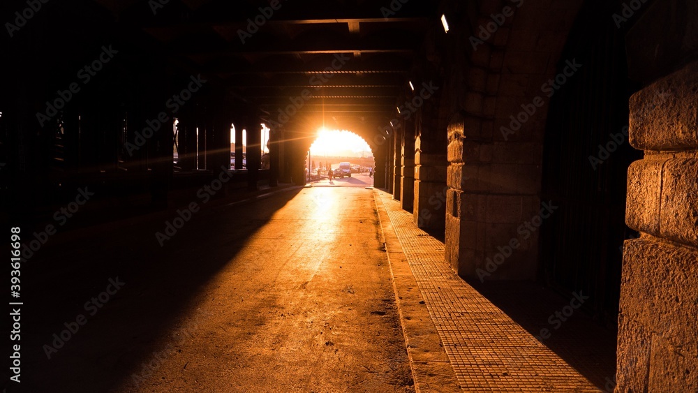 Sunset at the end of a tunnel