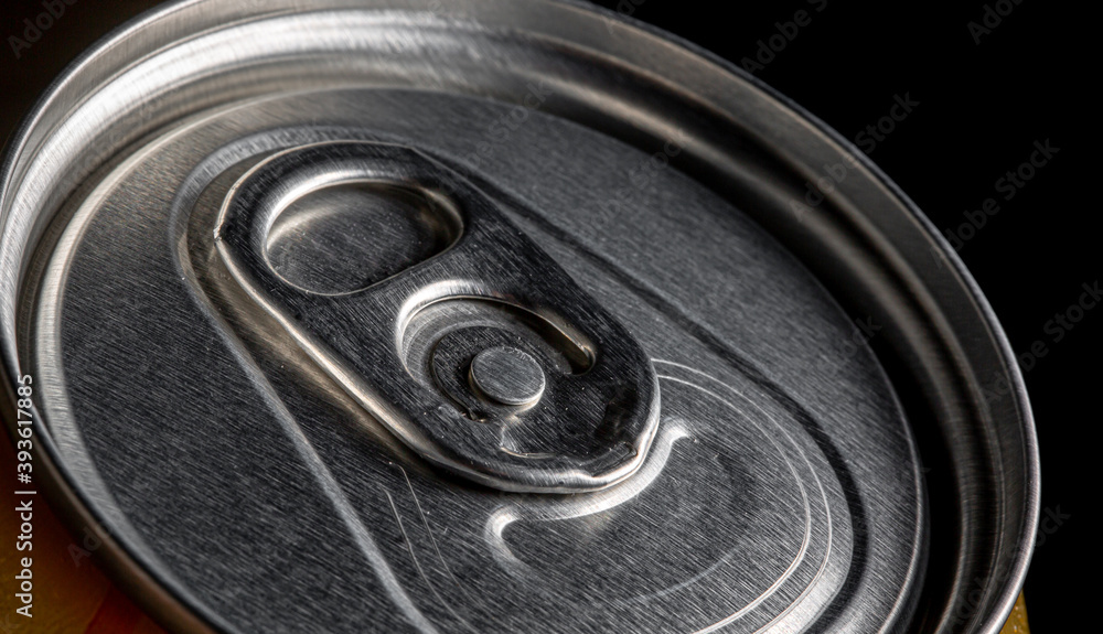 Close up of detail or macro of a can of beer, alcohol and drink concept Close up of detail or macro of a can of beer, alcohol and drink concept