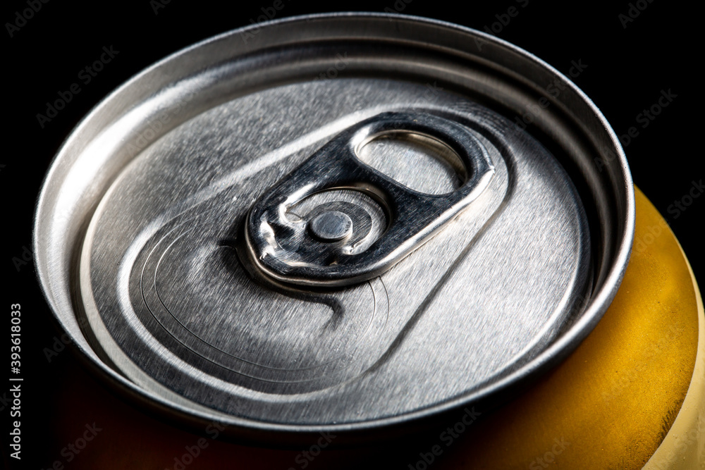 Close up of detail or macro of a can of beer, alcohol and drink concept