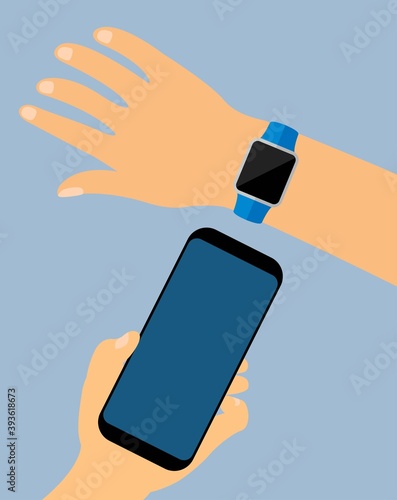Hand wearing a smartwatch connected to a smartphone