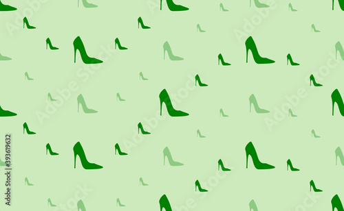 Seamless pattern of large and small green High heel shoe symbols. The elements are arranged in a wavy. Vector illustration on light green background