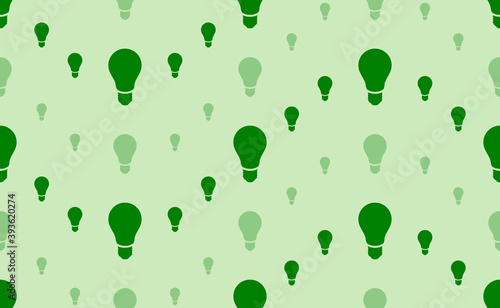 Seamless pattern of large and small green lamp symbols. The elements are arranged in a wavy. Vector illustration on light green background