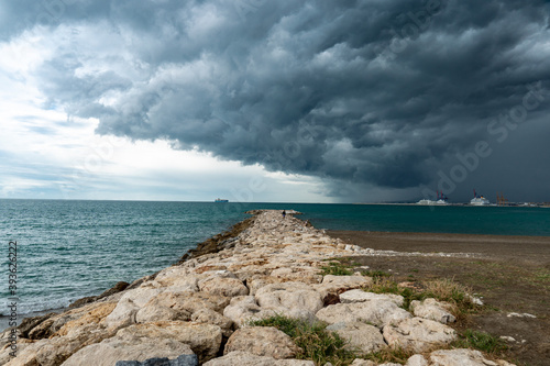 The storm is coming on the beach.