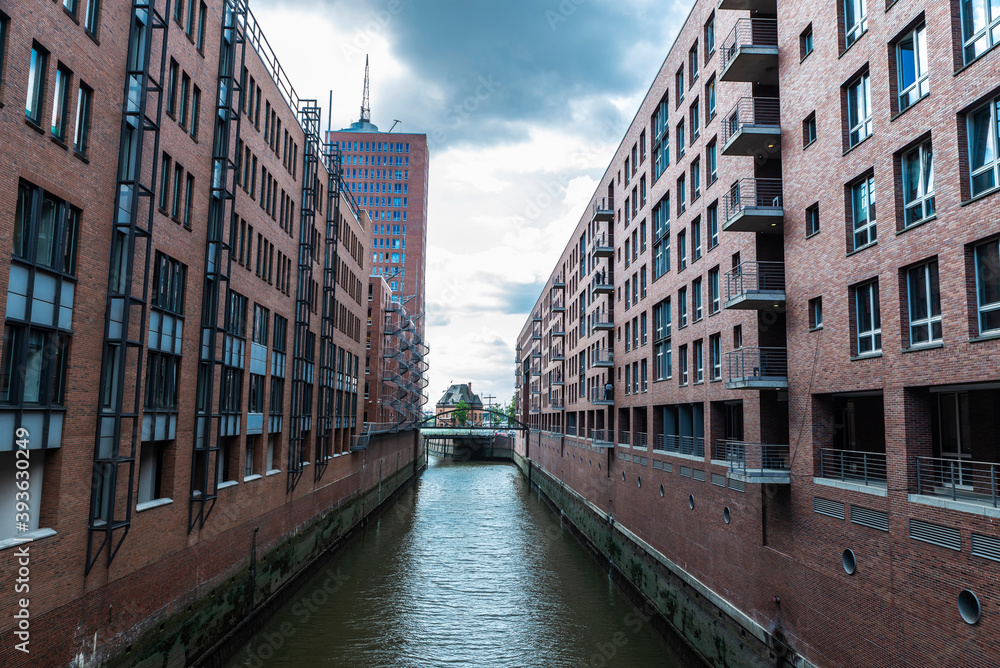 Modern buildings next to a canal in HafenCity, Hamburg, Germany