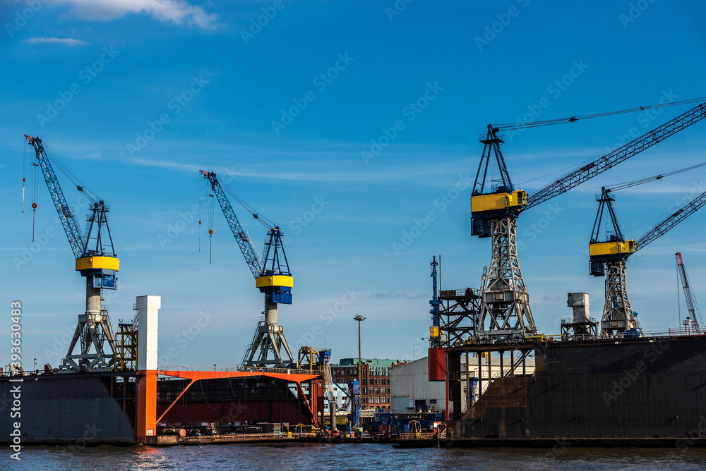 Container cranes in the port of Hamburg, Germany Container cranes in the port of Hamburg, Germany