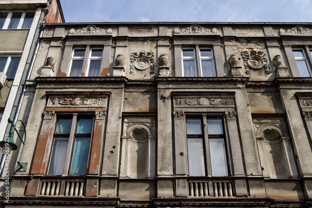 Facade of an old building with bullet holes in Sarajevo, Bosnia and Herzegovina. These marks date back to the siege of Sarajevo, from 1992 to 1996.