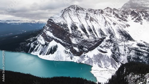 A winter timelapse of storm clouds moving across Lake Louise and Mt. Aberdeen in Banff National Park, Alberta, Canada in winter. 