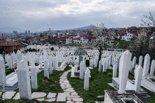 White graves in Alifakovac Cemetery in a cloudy day. Sarajevo, Bosnia and Herzegovina. photo