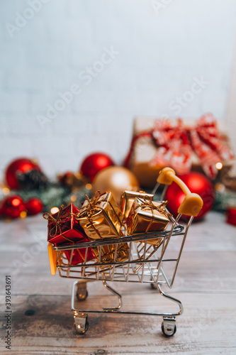 christmas shopping cart with gifts