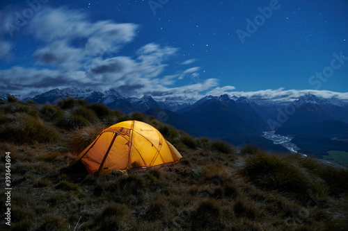 Camping out on top of Mt Alfred under moonlight. South Island, New Zealand.