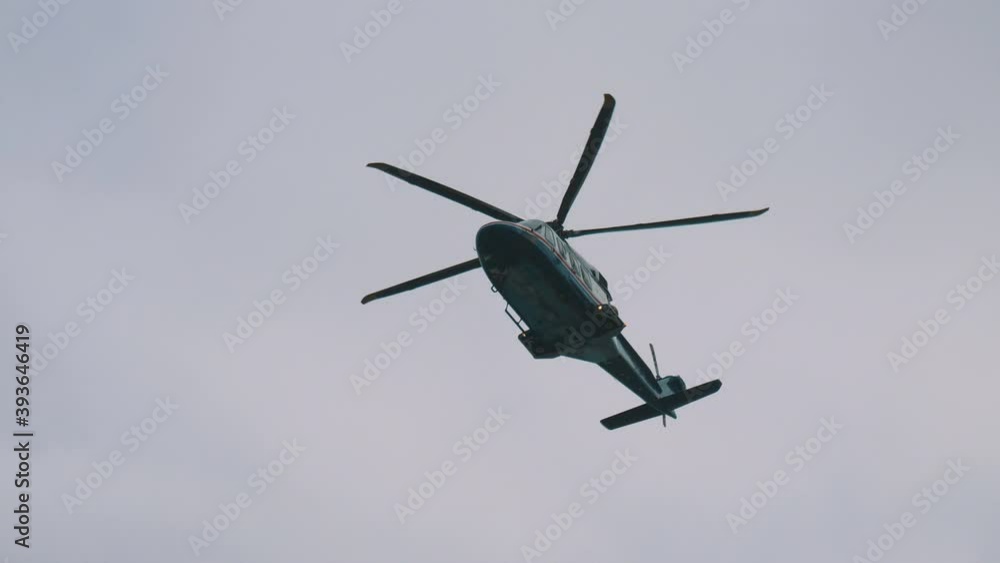 Helicopter flight on the sky in 4k slow motion 60fps Helicopter flight on the sky in 4k slow motion 60fps