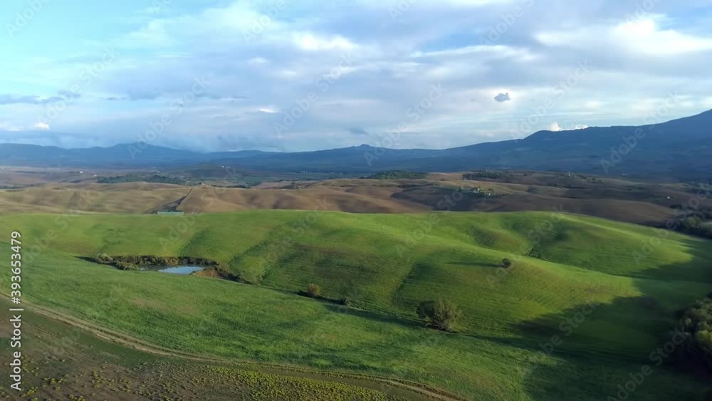 Tuscany aerial landscape of farmland hill country at evening. Italy, Europe Tuscany aerial landscape of farmland hill country at evening. Italy, Europe