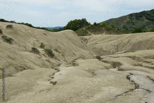 Landscape with cracked soil. Ground shape created by muddy volcanoes and natural-gas eruptions in Berca, Paclele Mari near Buzau