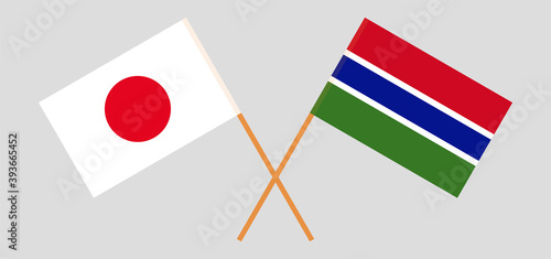 Crossed flags of Gambia and Japan