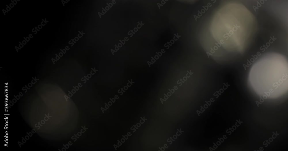 Golden light leaks isolated on black background. Lens studio flare leak shimmer overlays. Natural light rays bokeh effect. For compositing, transitions. 4K