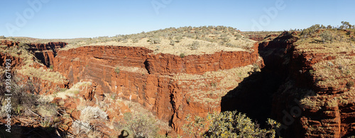 Arid dry red rock landscapes at Dales Gorge within Karijini National Park in the Hamersley Range of Western Australia.