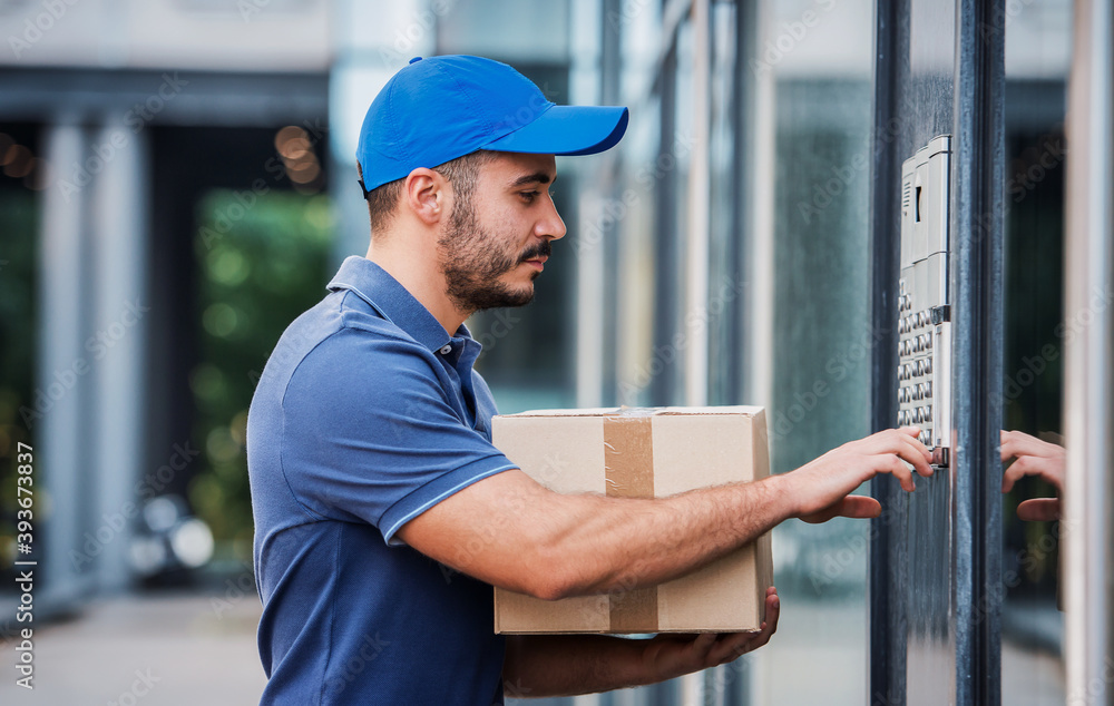 On time. Courier delivering package On time. Courier delivering package