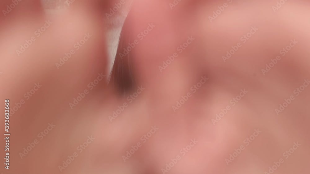 Young woman posing, touching the lens with her hands, styling her hair with her hands. The playful behavior of a woman in flirting. Feminine energy. Young woman posing, touching the lens with her hands, styling her hair with her hands. The playful behavior of a woman in flirting. Feminine energy.