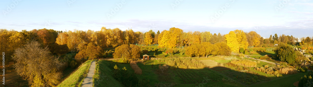 Naklejka premium Nature and city in autumn colors