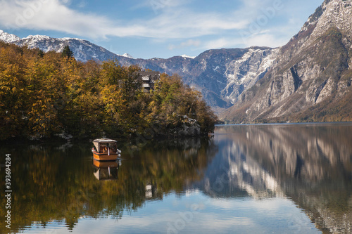 Picturesque lake Bohinj which reflects the Alps. Triglav National Park in Slovenia in autumn