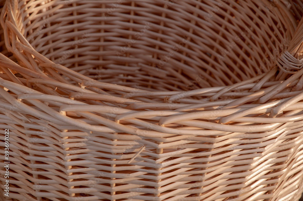 Wooden wickerwork with yellow straws. Wooden Basket Background Texture Wooden wickerwork with yellow straws. Wooden Basket Background Texture