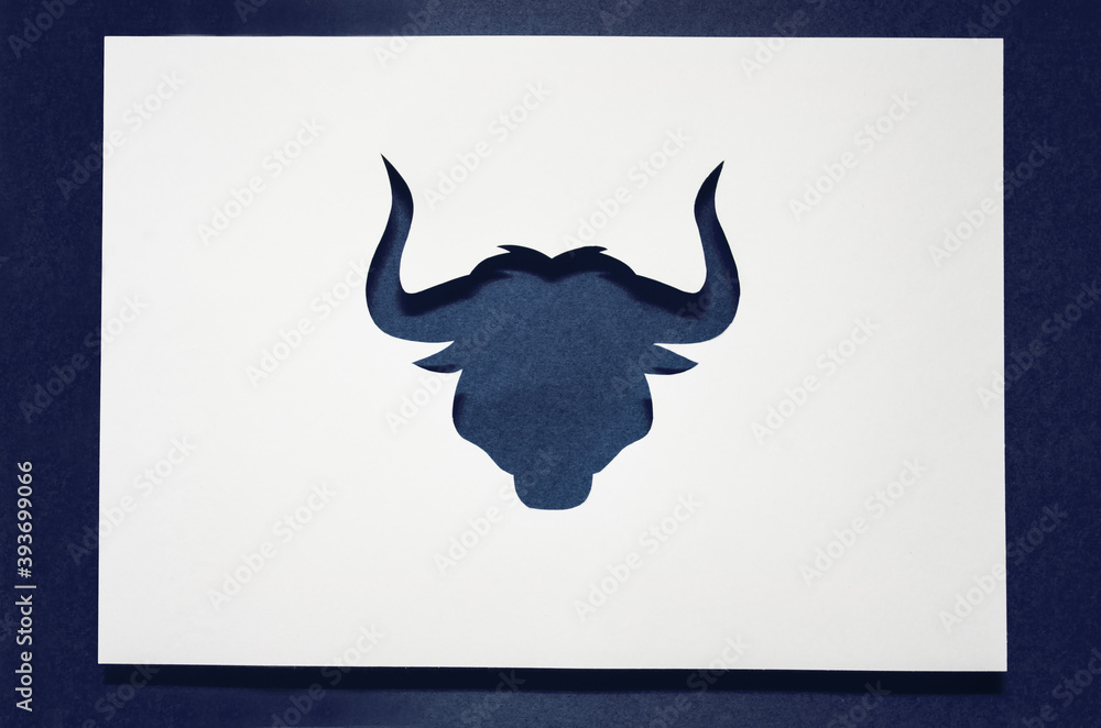 Fototapeta premium Happy bull year. Christmas tendy card 2021. silhouette of a grey bull. Chinese Zodiac. Chinese new year 2021. paper cut style. paper cut bull. Happy new year