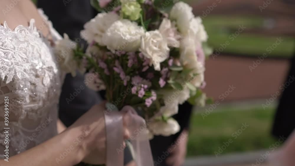 Bride and groom walking in a city street in summer day Wedding Bride and groom walking in a city street in summer day Wedding