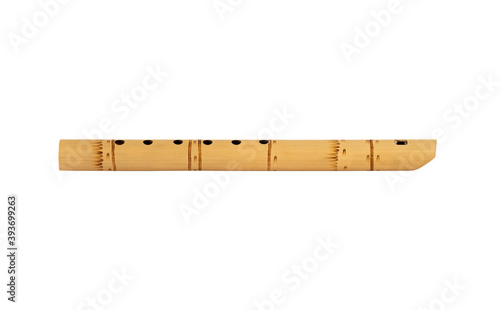 Quen's Peruvian Flute, isolated on white background. South American national musical instrument. A folk musical instrument of the Indians.