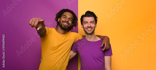 Blank and white friends. Concept of integration, union and partnership. Yellow and violet background