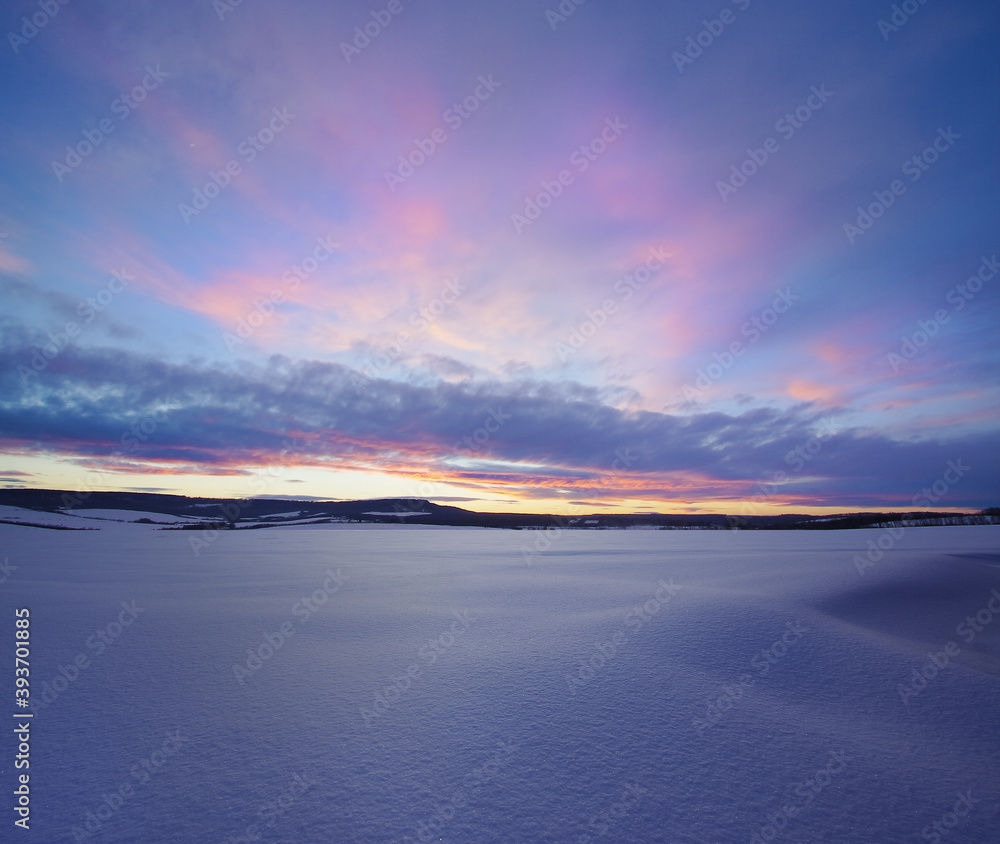 Fototapeta premium A serene winter landscape after sunset.