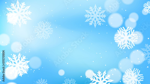 Christmas background with bokeh and snowflakes
