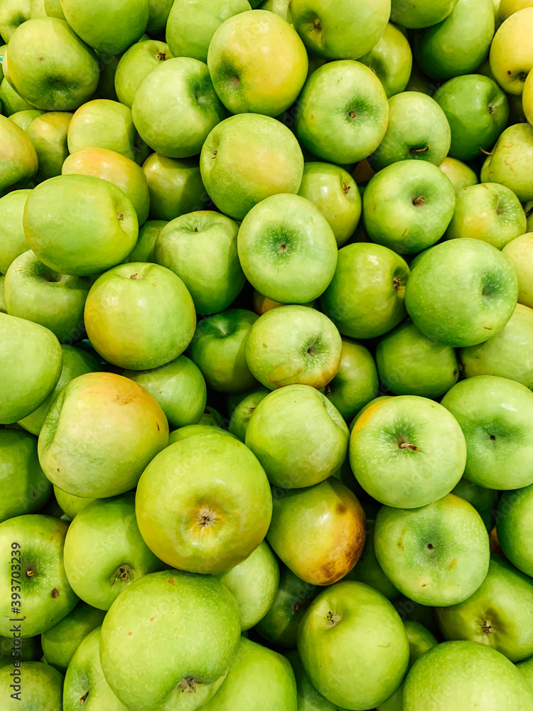 lots of ripe fruit sweet apples for cooking as a background lots of ripe fruit sweet apples for cooking as a background