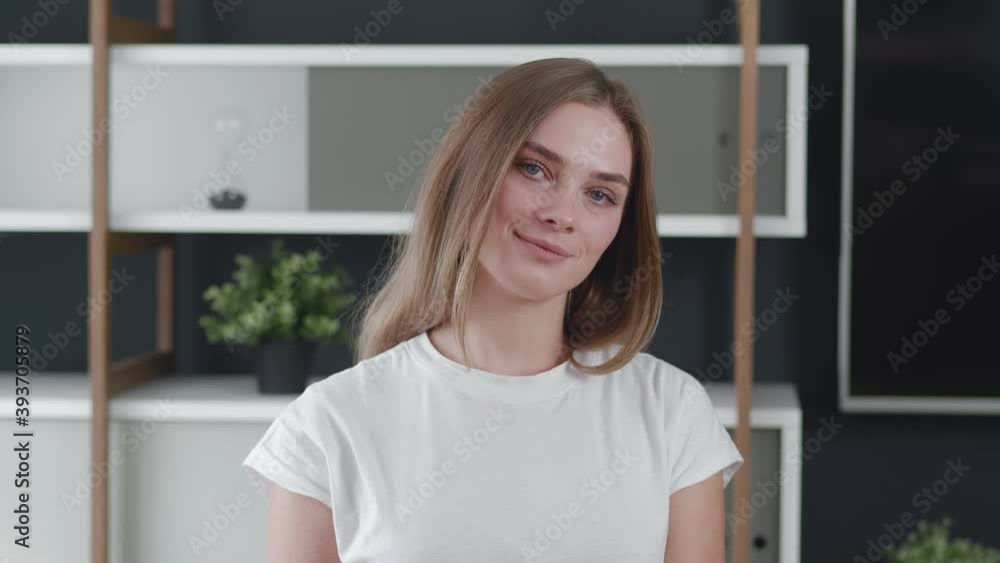 Portrait beautiful young student woman smiling looking at camera, enjoying successful lifestyle at home office background Portrait beautiful young student woman smiling looking at camera, enjoying successful lifestyle at home office background