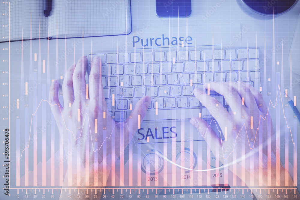 Double exposure of man's hands typing over laptop keyboard and forex chart hologram drawing. Top view. Financial markets concept. Double exposure of man's hands typing over laptop keyboard and forex chart hologram drawing. Top view. Financial markets concept.