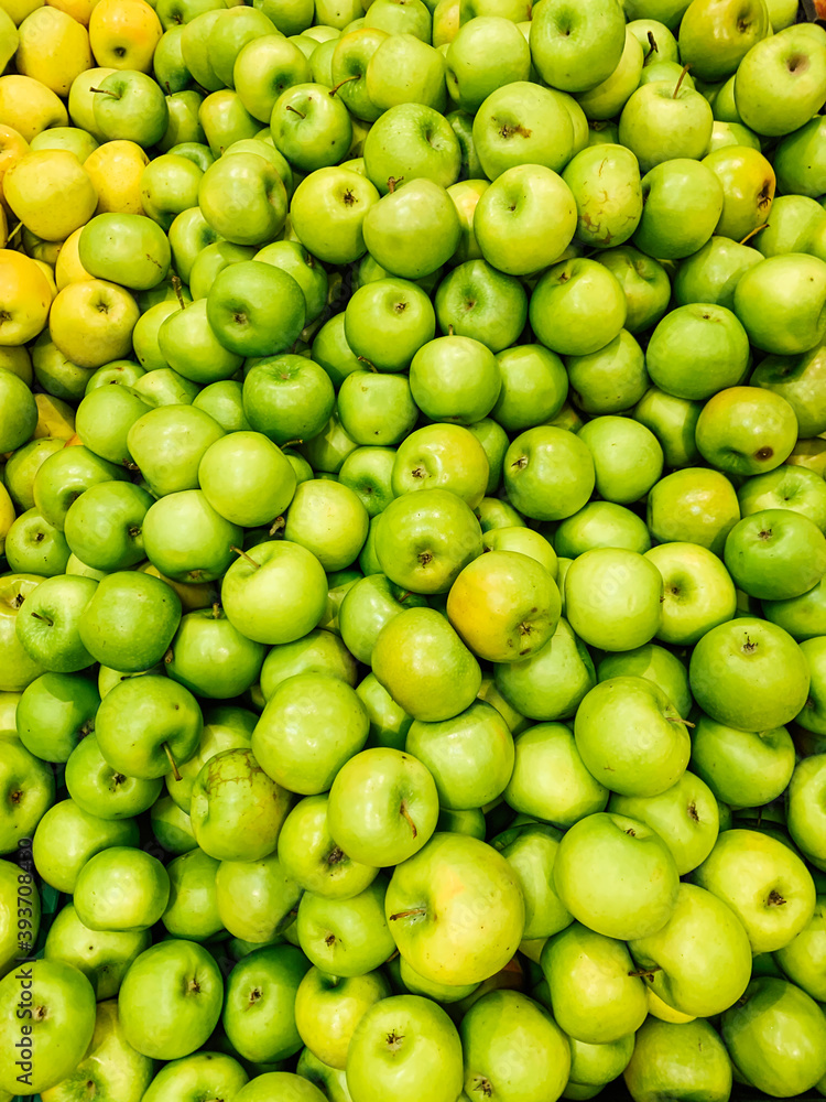lots of ripe fruit sweet apples for cooking as a background lots of ripe fruit sweet apples for cooking as a background