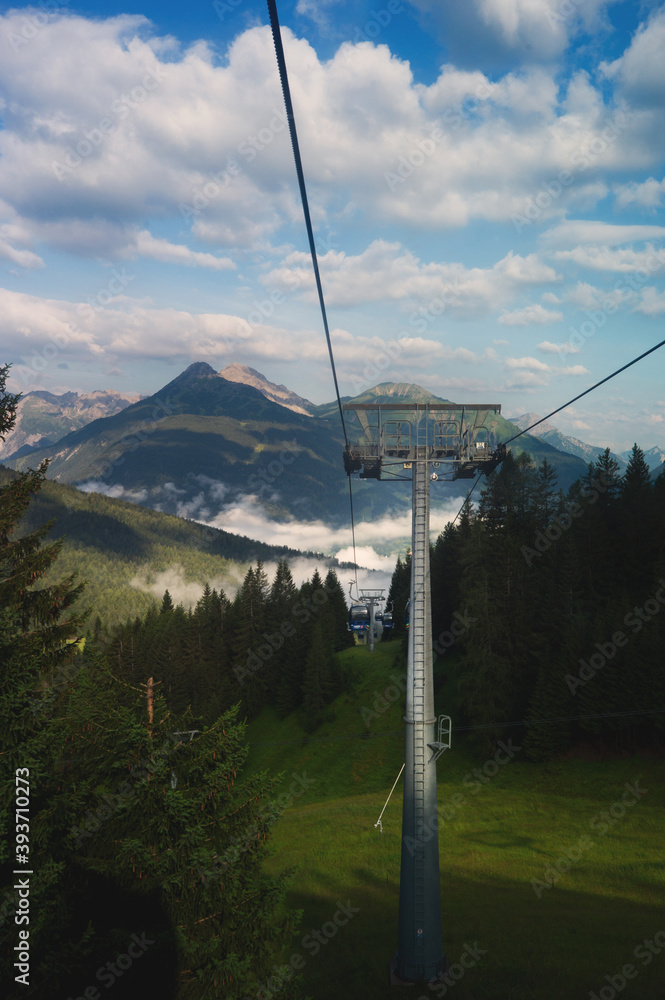 Picturesque mountain landscapes in summer, inviting for hiking with views of the highest peaks of the Alps. Mountain sports enthusiasts and hikers immediately have wanderlust