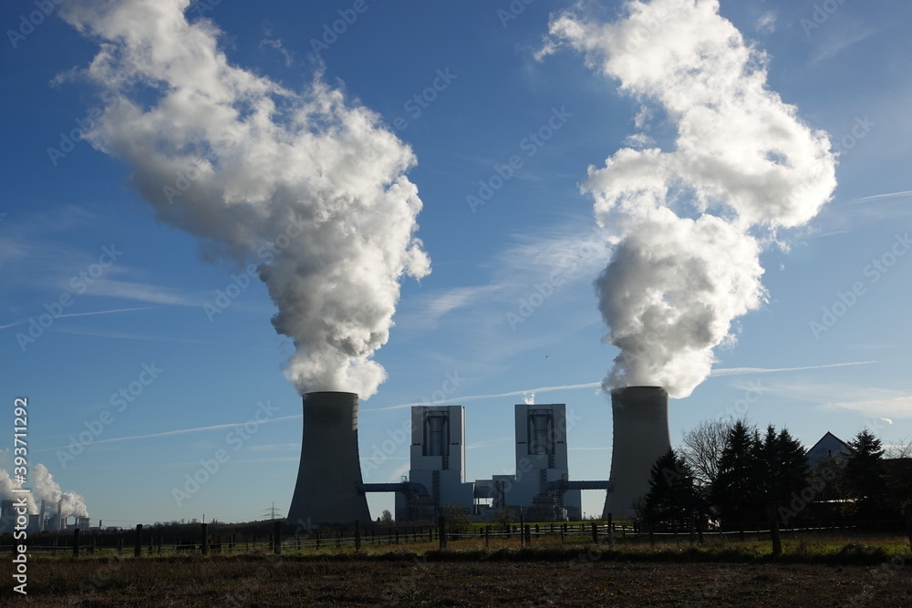 Coal-fired power station in Neurath, which generates steam from cooling towers Coal-fired power station in Neurath, which generates steam from cooling towers