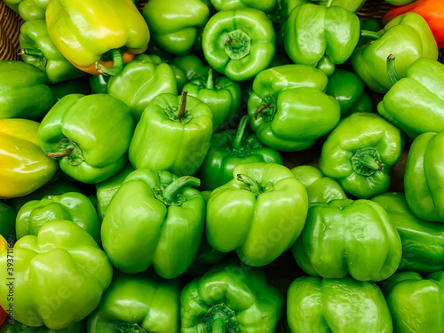 lots of green pepper for cooking as a background