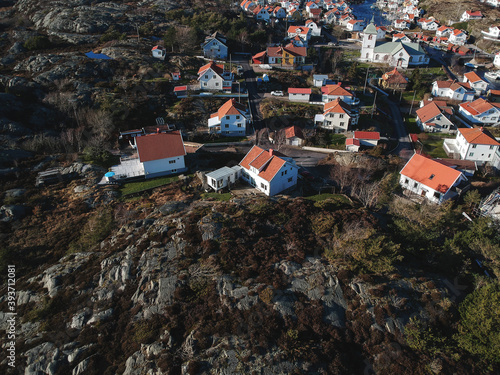 Experience the serene beauty of Sweden's archipelago coast with its iconic red wooden houses, chilly sea and tranquil atmosphere. Perfect for tourism and travel