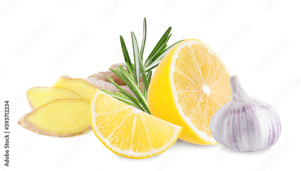 Ginger root, lemon, garlic and rosemary on white background Ginger root, lemon, garlic and rosemary on white background