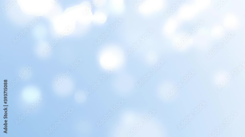 A baby shower themed motion background with a soft baby blue tone and cotton colored bokeh circles floating and falling from the sky motion background. A baby shower themed motion background with a soft baby blue tone and cotton colored bokeh circles floating and falling from the sky motion background.