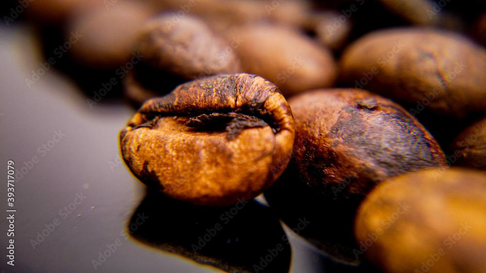 Macro shot over roasted coffee beans - food photography Macro shot over roasted coffee beans - food photography