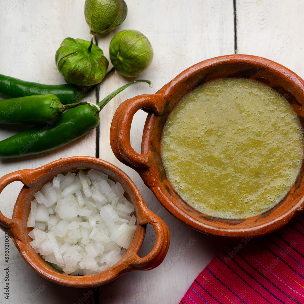 Mexican green sauce on white background Mexican green sauce on white background