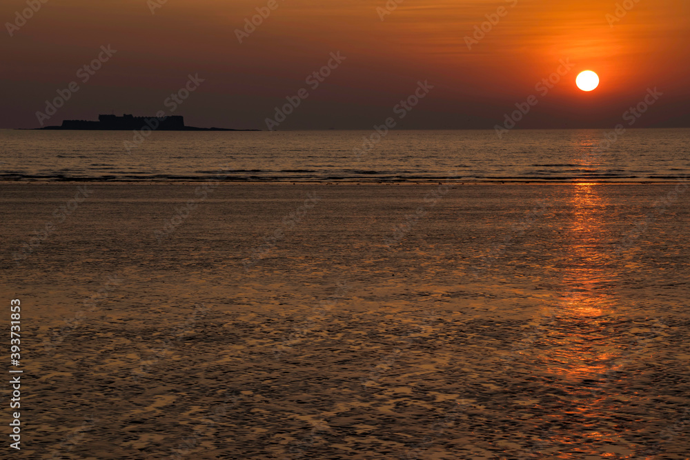 Naklejka premium Sunset on the Beach