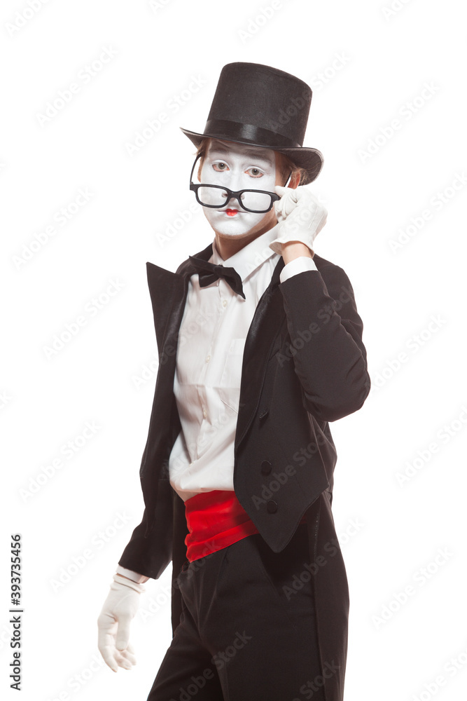 Portrait of male mime artist performing, isolated on white background. Mime lowered his glasses to look directly into eyes Portrait of male mime artist performing, isolated on white background. Mime lowered his glasses to look directly into eyes